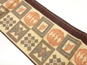 手織り紬色紙に幾何学模様織出し名古屋帯